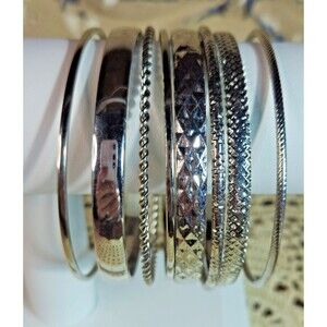 8 Piece Various Styles Silver Tone Textured Bangle Bracelet Set (1 Monet)
